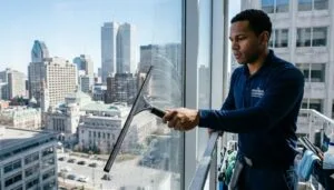 Professional squeegee technique for streak-free window cleaning in Montreal